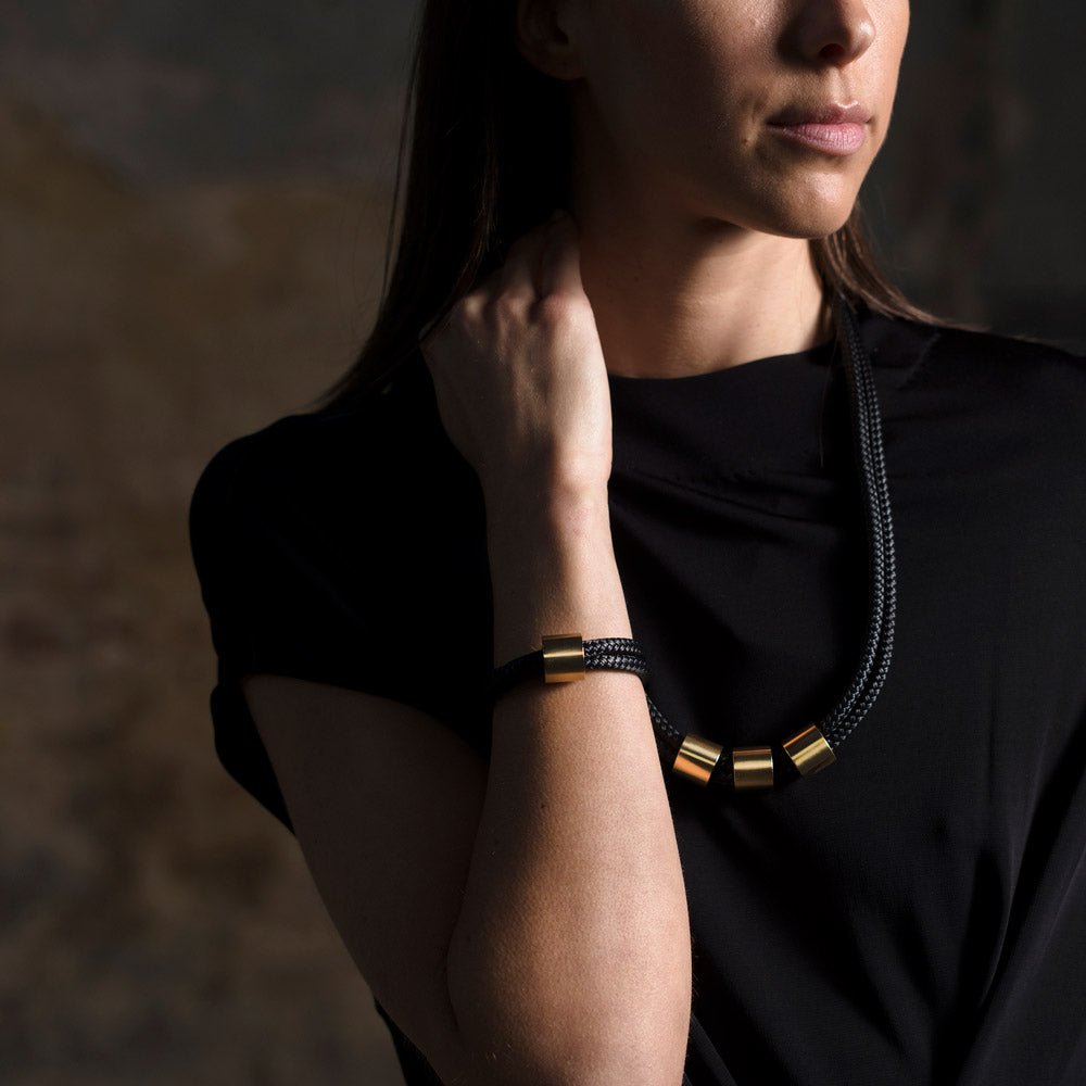 We're excited to introduce the Fibre collection, a bold and bright collection of versatile necklaces and bracelets. Available in black, blue and pink, beautiful brass pieces of signature Alice Made This hardware are paired with Dyneema cord to create stat